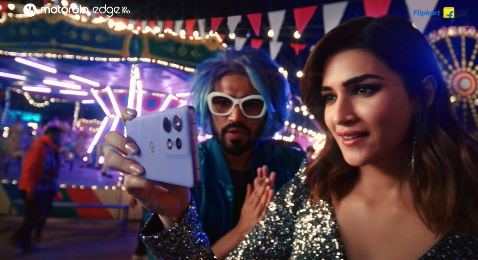 Motorola's new ad with Kriti Sanon and Babil Khan showcases the AI-powered edge50 pro with an 'Intelligence Meets Art' theme.